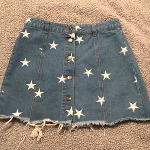 Jean skirt with white stars. Never worn